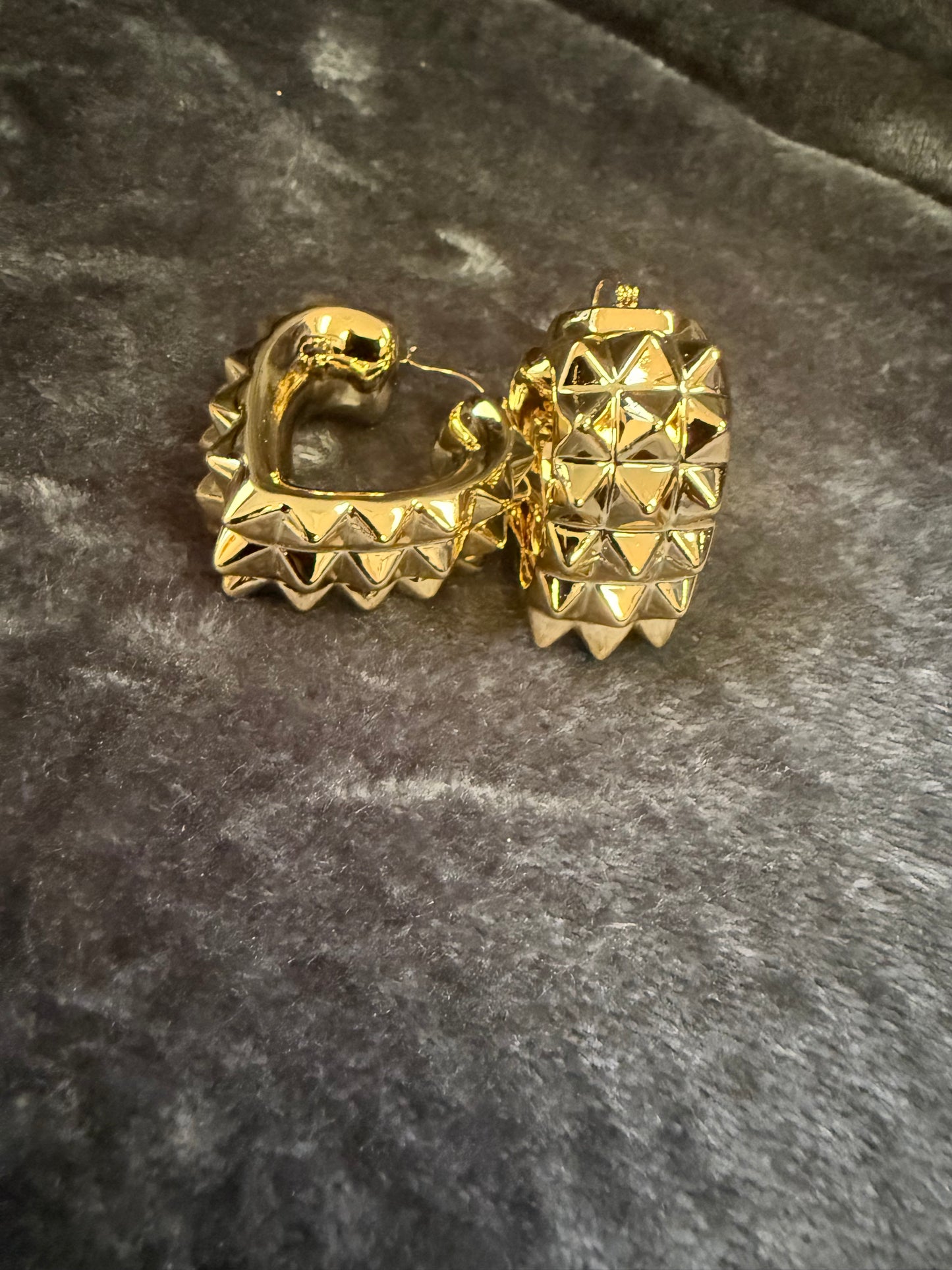 Gold heart shaped spike earring